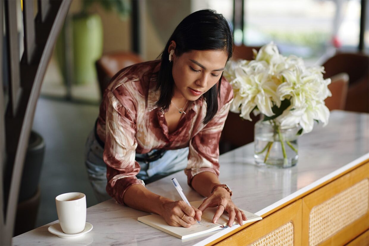 Realtor writing out a marketing strategy