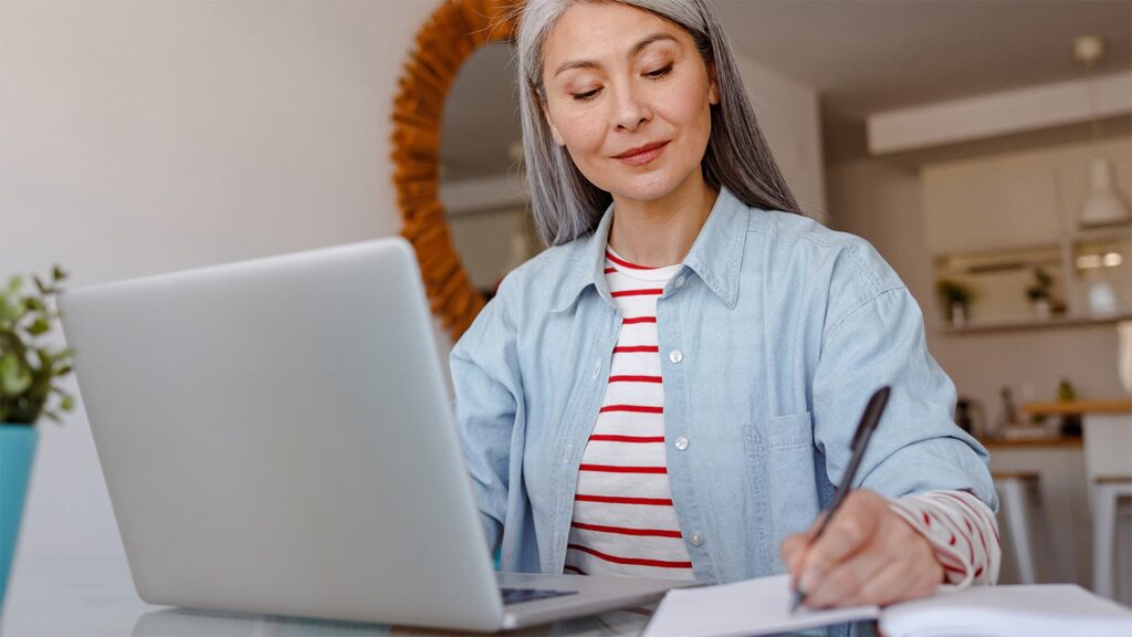 Real estate agent working on laptop