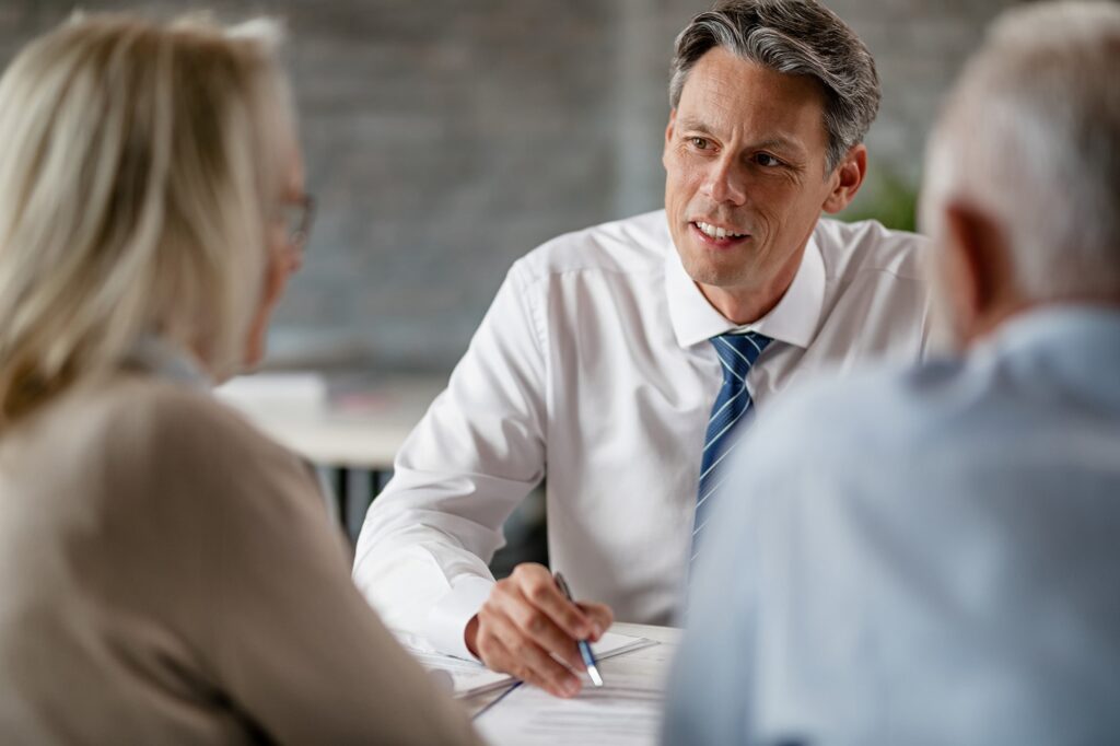 Real estate agent negotiating with their clients